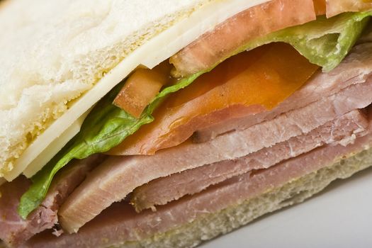 close up of a  ham and cheese sandwich