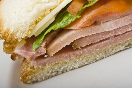 close up of a  ham and cheese sandwich