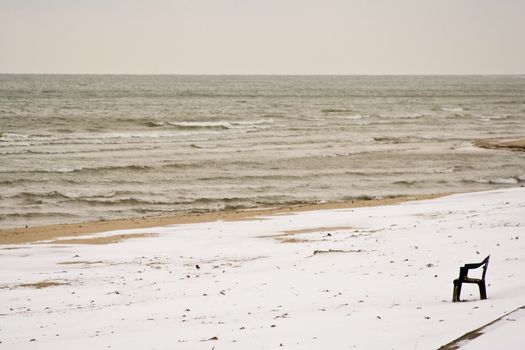 I brought my chair to the beach but it's just too cold to swim hurry up summer