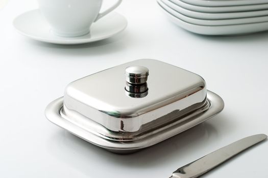Dishware on a light background. The concept for a restaurant or cafe.