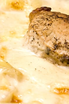 creamy scalloped potatoes and pork chop bake 