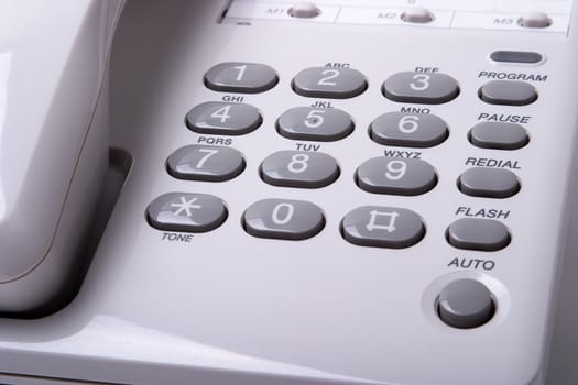 Office white phone close-up.