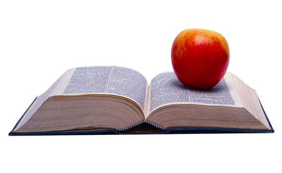 The concept of learning. Apple and the open book. Carefully isolated on a white background.