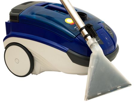 Powerful modern vacuum cleaner for wet cleaning. Isolated on a white background.