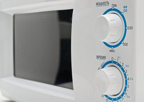 White microwave oven close up.
