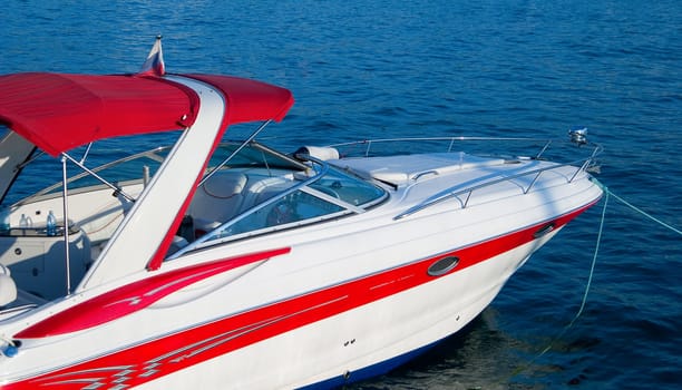 White luxurious yacht on a background a dark blue sea