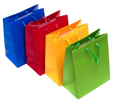 Multi-coloured packages for purchases are isolated on a white background