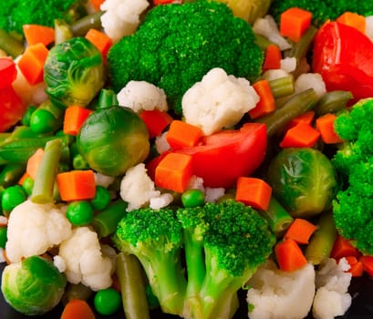 Healthy food: cauliflower, brussels sprouts, broccoli, carrots, string beans  and green peas