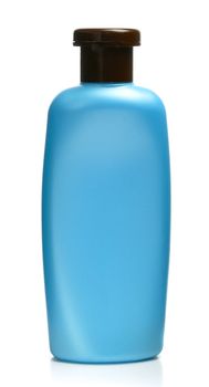 The blue bottle of shampoo is isolated on a white background