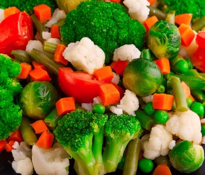 Healthy food: cauliflower, brussels sprouts, broccoli, carrots, string beans  and green peas