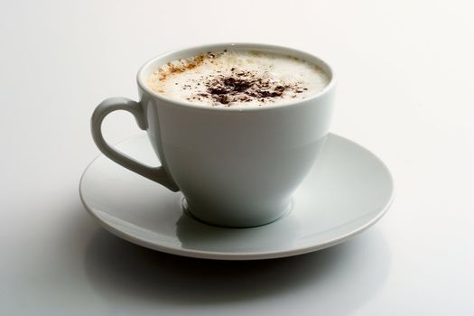 Cappuccino mug on a gray background