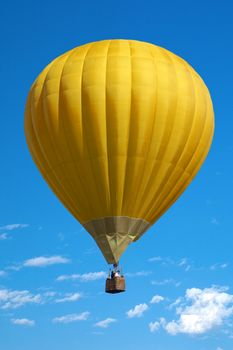 Balloon on a background blue sky