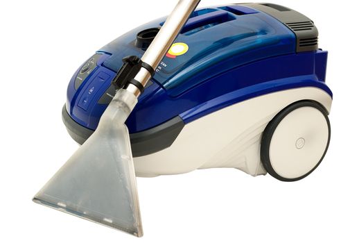 Vacuum cleaner is isolated on a white background