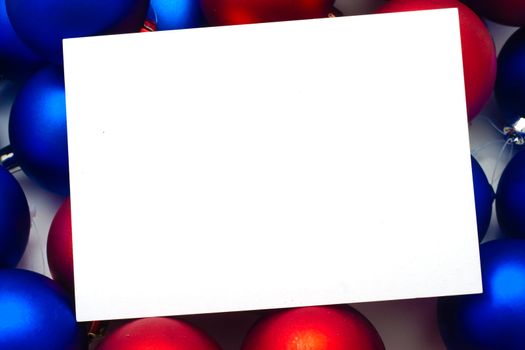 Christmas frame for congratulations. Field for the text on a background of bright Christmas balls