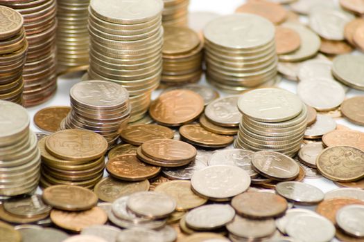 Piles of coins. The concept of cash, savings, finance and business
