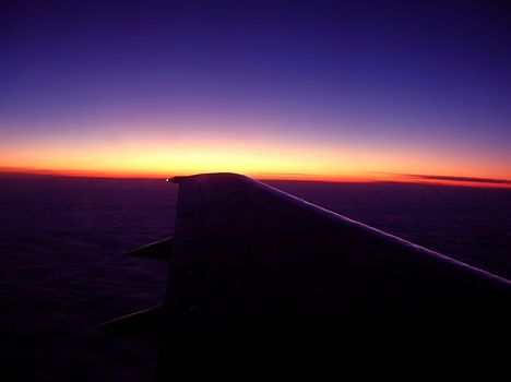 horizon line sunset sky from flying plane view