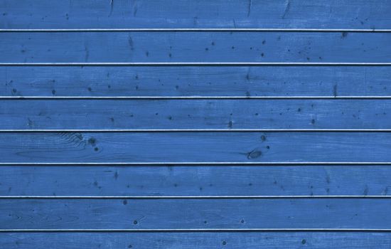 Wall of pine blue wood board. Lining closeup, frontally.