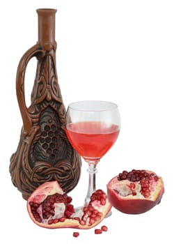 Still-life with a glass of wine, bottle and a red pomegranate