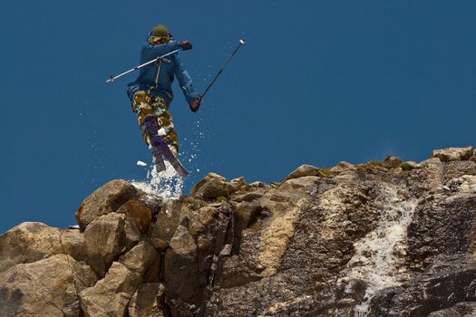 Freerider jumping in a mountains, Caucasus, Elbrus, summer