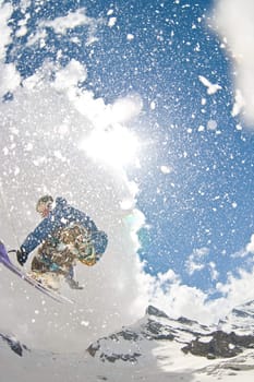 Freerider jumping in a mountains, Caucasus, Elbrus, summer