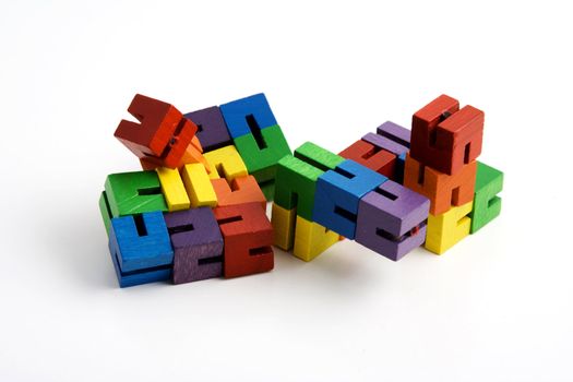 wooden blocks on string to help children focus their attention while studying in class teachers give to students that have learning disorders like adhd