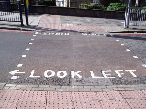 Look right look left sign on London zebra crossing