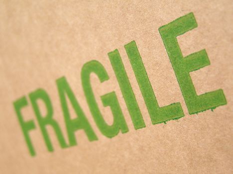 Fragile written on corrugated cardboard box