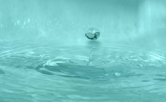 Water drop on blue background