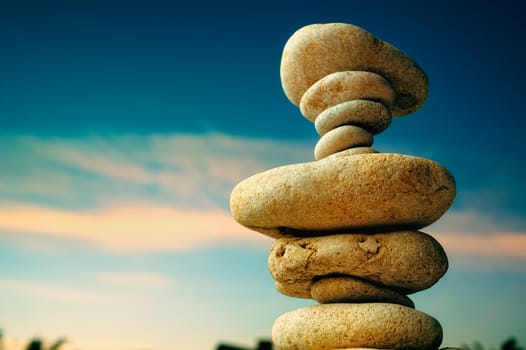 Balancing of pebbles on the sea coast
