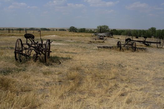 old farm equipment on the prairie