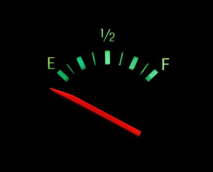 Gas gauge bright colors on empty on a black background