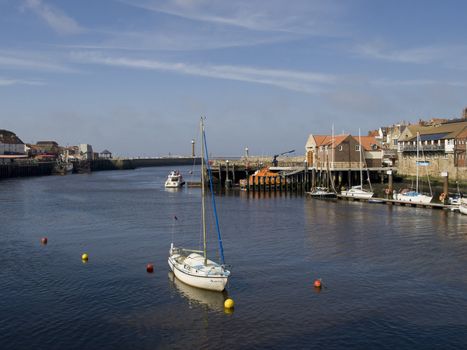 A peaceful sunny scene at Whitby harbour