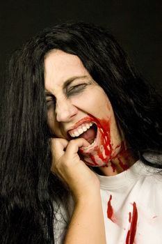 a screaming women, dressed for halloween