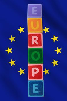 toy letters that spell europe against a flag background with clipping path