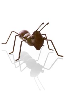 an ant, made of metal on a white background