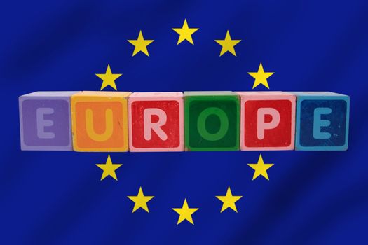 toy letters that spell europe against a flag background with clipping path