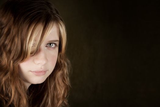 Portrait of pretty teen girl with green eyes