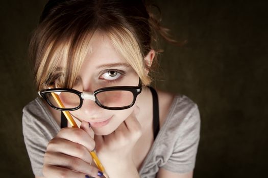 Portrait of nerdy teen girl with green eyes