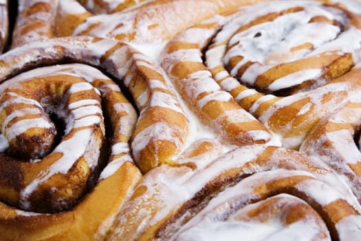 close up of cinnamon rolls fresh out of the oven just waiting for breakfast