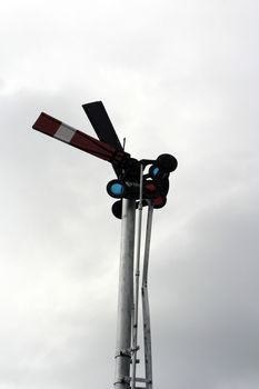 rr sign against blue grey sky