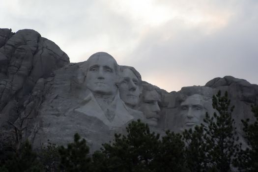 Mt Rushmore at dusk colorful sky