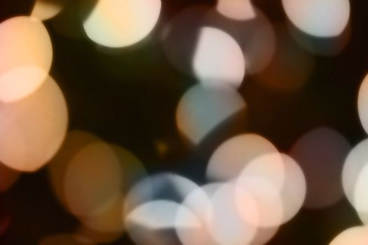Lights shot purposefully out of focus. Could yse as a lens flare. Great use for a holiday or festive background!