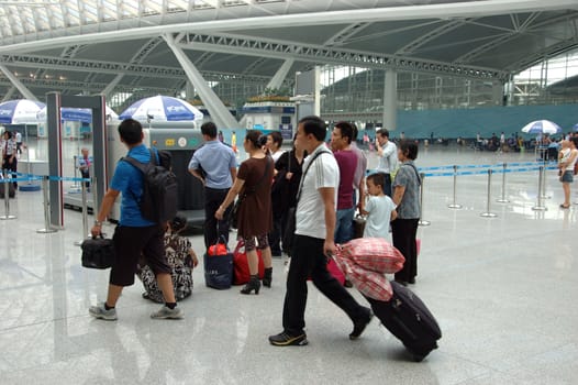 GUANGZHOU, CHINA - SEPTEMBER 29: Guangzhou South Railway Station for high-speed trains on September 29, 2010. Station operates 32 trains daily, has 28 platforms, serves 200000 passengers per day.