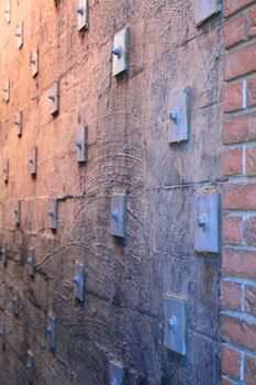 Close up of a brickwall showing unique pattern.
