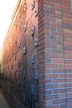 Close up of a brickwall showing unique pattern.
