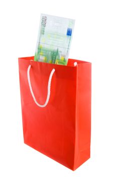 Concept of money falling in shopping bag. Blur on banknotes for motion.