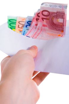 Hand holding euro money in envelope. Isolated.