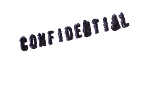 Top view of a rubber stamp with a giant word "CONFIDENTIAL" printed, on isolated white background. 
