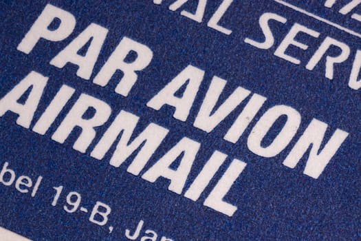 Air mail postmarks isolated on a blue background