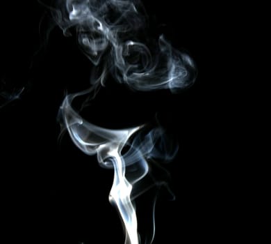 Smoke with a black background. Abstract element to help your design